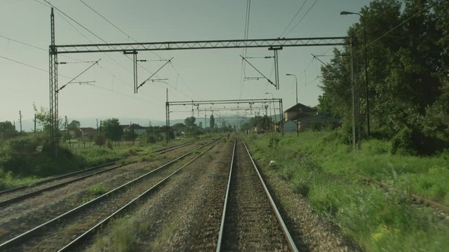 A train entering a trainstation.