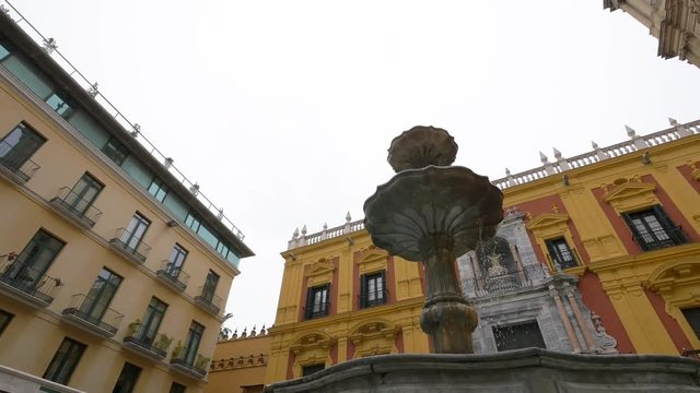 Low angle of a fountain and the Obispado