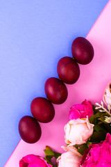 Easter red eggs on bright background