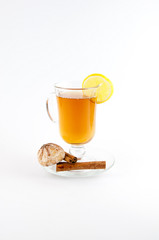 Tea cup with lemon and cinnamon isolated on white background.