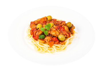 Spaghetti, chicken fillet with vegetables and olives