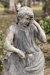 Fototapeta na wymiar Historic Sculpture from the mystery old Prague Cemetery, Czech Republic