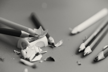 Sharpen the colored pencils with a sharpener.