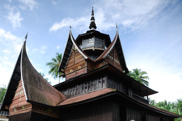 Traditional and colorful wood carving detail at Surau Nagari Lubuk Bauk at Tanah Datar, Sumatera...