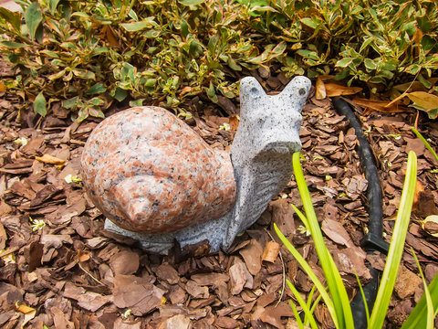 Decorative snail in the garden 