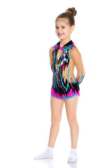 The gymnast prepares to perform the exercise.