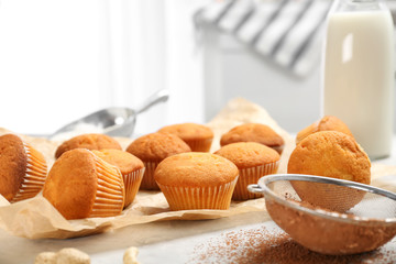 Tasty cupcakes on table. Fresh from oven