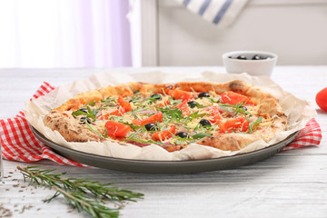 Tasty pizza on table. Fresh from oven