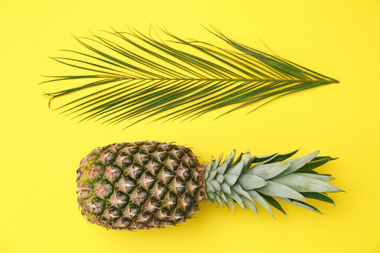 Fresh pineapple on color background, flat lay