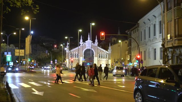 People crossing the Calle Arocas