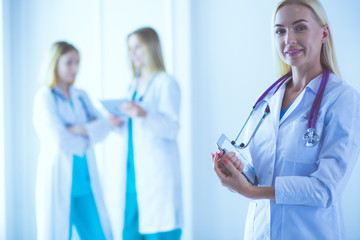 Beautiful woman face near doctor with syringe