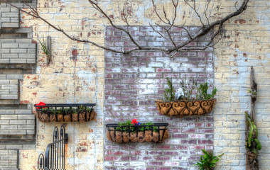 Brick Wall With Flower Baskets