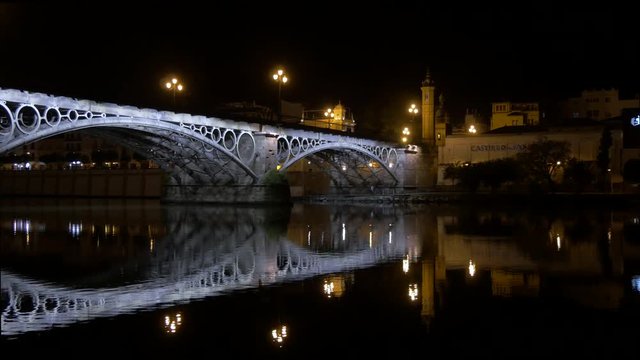 Puente de Isabel II at night