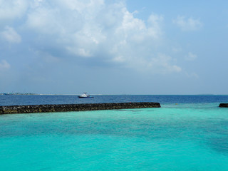 A boat is floating on the sea