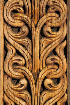 Norwegian viking  wooden knot work on the side of a building