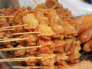 Fried dumplings sticks sale on street food, Thailand. Chinese food