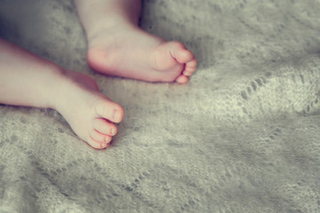 Small newborn baby foot