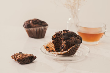 Breakfast with fresh homemade delicious muffins and tea.