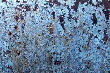 Old rusty metal surface. Flaky paint. Metal corrosion.