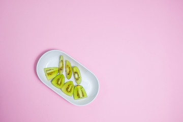 Kiwi fruit on color background.