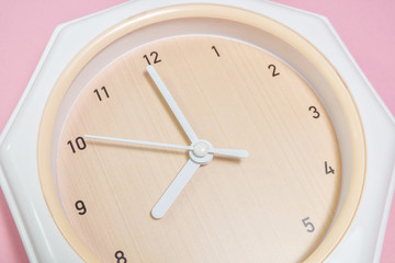 Top view Clock on color background.