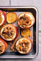 Baked apples with granola, cinnamon, nuts