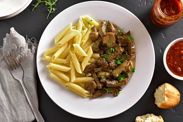 Beef stroganoff with mushrooms and pasta