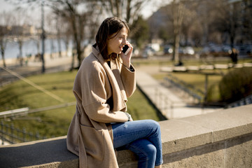 Fototapeta premium Woman talking on the mobile phone