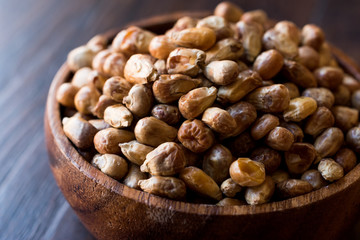 Turkish Snacks Kavurga / Fried Corn Seeds in Wooden Bowl.