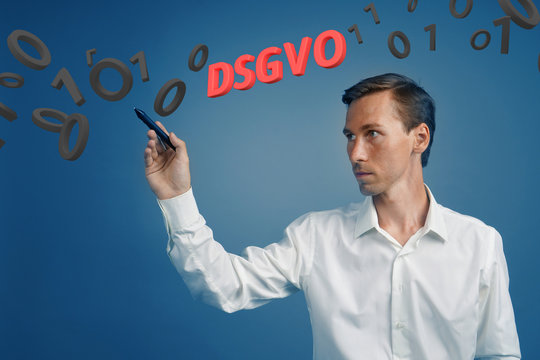 DSGVO, german version of GDPR, concept image. General Data Protection Regulation, protection of personal data. Man working with information. Datenschutz-Grundverordnung.