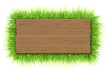 Empty wooden sign with space for text on a green grass background. The template for a banner or an advertisement for a seasonal discount.