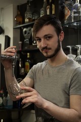 waiter serving beer in the pub