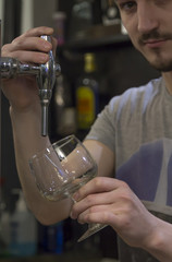waiter serving beer in the pub