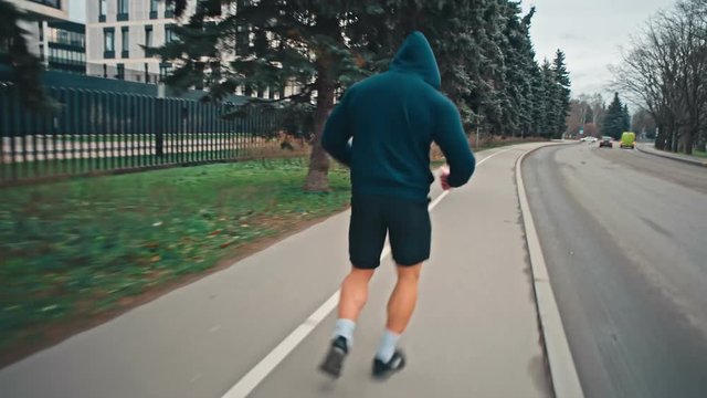 Male Runner Exercising On Street