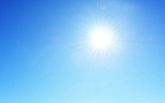 bright white sun on a blue sky.beautiful natural landscape, background