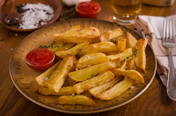 Homemade french fries with organic ketchup
