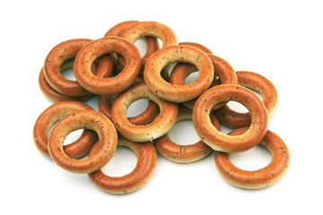 Fresh baked bagels. Bagel breakfast on isolated white background. Diet snack food.