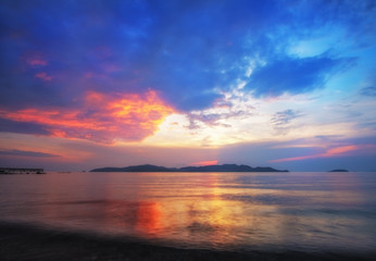 Fototapeta premium The colorful sunset cloud at the evening beach.