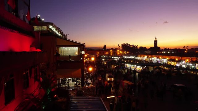 Famous Jemaa el Fna square crowded at sunset, Marrakesh, Morocco, timelapse 4k
