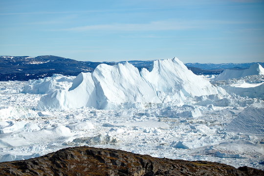 Greenland. Floating icebergs  near the coast of Ilulissa