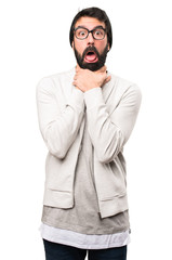 Hipster man drowning himself on white background