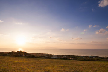 Wide Grass field by the ocean in Ishigaki island, Okinawa, Japan