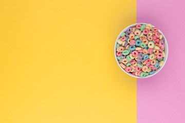 Bowl of colorful cereals top view