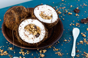 Healthy breakfast in coconut bowl.