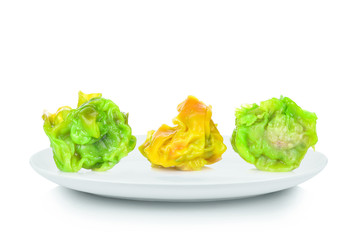 shumai in white plate on white background