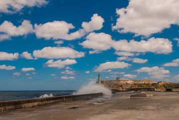 Stormy waves hitting the seawall near to The Castillo Del Morro lighthouse in Havana. The old fortress Cuba