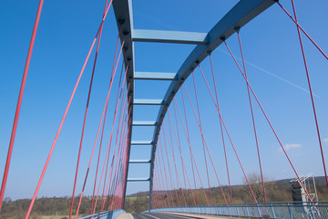  Blue red bridge over the river Main