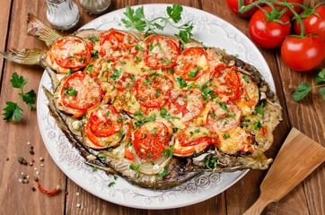 Grilled fish with vegetables and cheese