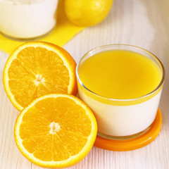 Food. Panna cotta. Italian milk fruity dessert made of yogurt and cream with lemon and orange.