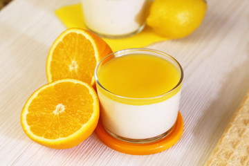 Food. Panna cotta. Italian milk citrus dessert made of yogurt and cream with lemon and orange.